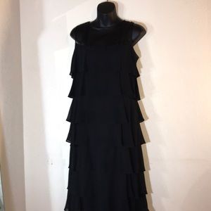 Little Black dress. pleaded, sleeveless